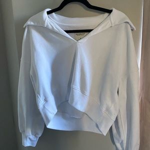 White cropped sweatshirt.
